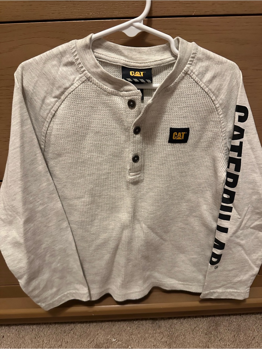 Caterpillar Cream Long Sleeve Henley with Logo Sleeve Print